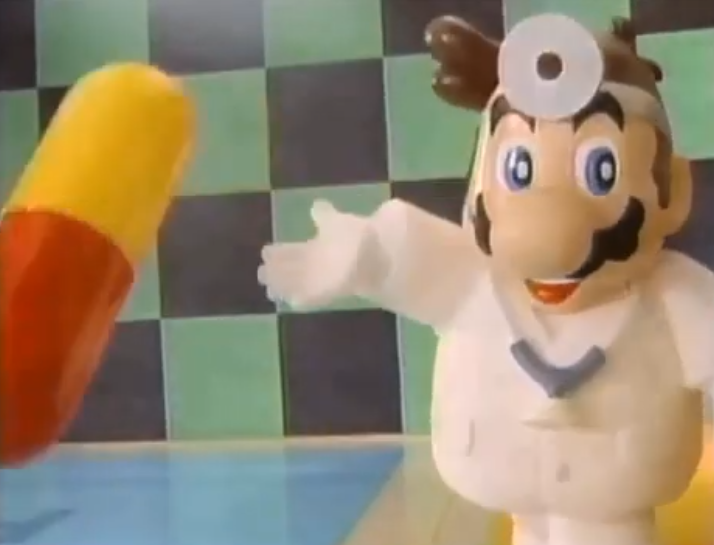 An odd looking dr mario figurine throwing a pill