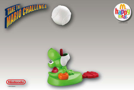 happy meal yoshi toy ad sticking his tongue out upward. the text says Take the Mario Challenge