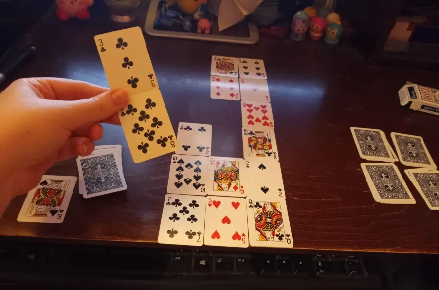 picture of my desk with cards on it playing doctorvsvirus