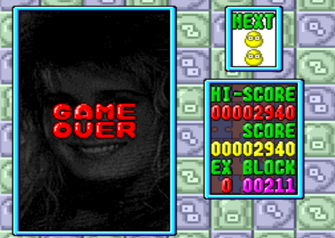 news game over. with a woman's smile peering from the darkness